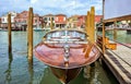 Daylight view to parked classic yacht on pier