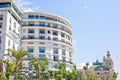 Daylight view to round shape hotel building facade with ornament