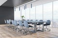 Daylit wooden and concrete meeting room interior with panoramic city view, daylight and large table with chairs. Corporate design Royalty Free Stock Photo