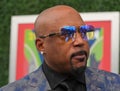 Daymond John, Entrepreneur and Co-star of ABC's Hit show Shark Tank, at the blue carpet before 2023 US Open opening ceremony