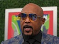 Daymond John, Entrepreneur and Co-star of ABC's Hit show Shark Tank, at the blue carpet before 2023 US Open opening ceremony