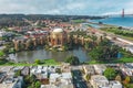 Daytime aerial photo of the Palace of Fine Arts, in San Francisco, California, USA. The Golden Gate Bridge is in the background.