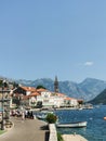 Daytime cityscape with sea and mountains in old town of Perast, Montenegro