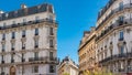 Daytime shot of typical French residential buildings in Batignolles under the blue sky