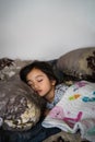 Daytime sleeping time of a toddler child. Little girl sleeping on the bed