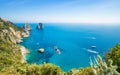 Daytime view of famous Faraglioni rocks near Capri island, Italy Royalty Free Stock Photo