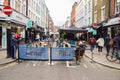 Street seating outside cafes and restaurants in Soho, London