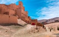 Daytime wide angle shoot of Adobe House Village in the Draa Valley, Morocco