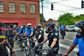 Dayton, Ohio United States 05/30/2020 police officers putting on gas masks preparing to deploy OC pepper spray and tear gas at a