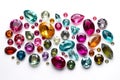 Dazzling Array of Colored Gems on White Background Royalty Free Stock Photo