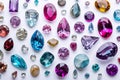 Dazzling Array of Colored Gems on White Background Royalty Free Stock Photo