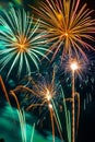 A dazzling display of St. Patrick's Day green and golden color fireworks lighting up the night sky. Royalty Free Stock Photo