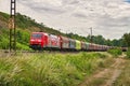 DB Cargo class electric locomotive driving over the railway tracks in Himmelstadt, Germany