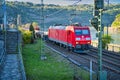 DB Cargo class 185 electric locomotive pulls a freight train through Oberwesel
