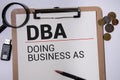 DBA Registration doing business as form on a table. Royalty Free Stock Photo