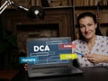 DCA Dollar Cost Averaging - Thoughtful female person showing laptop screen