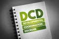 DCD - Developmental Coordination Disorder acronym on notepad, medical concept background Royalty Free Stock Photo