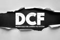 DCF Design Rule for Camera File System abbreviation highlighted in bold worn typography. Photography and camera technology acronym Royalty Free Stock Photo
