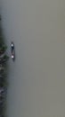 Aerial View of Small Fishing Boats Floating on the River in the Forest Royalty Free Stock Photo