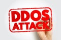 DDOS ATTACK text in bold red stamp style with a hand writing using a marker. Concept image for cybersecurity, online threats, data Royalty Free Stock Photo