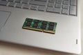 DDR3 sodimm RAM memory card module in black laptop closeup