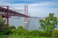 25 de Abril bridge, or Salazar bridge seen from Almada to Lisbon-Portugal.