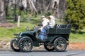 1904 De Dion Bouton 8 hp V Tonnaeu driving on country road Royalty Free Stock Photo