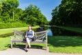 Girl in the park of De Haar Castle in Netherlands Royalty Free Stock Photo