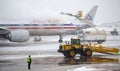 De-icing Aircraft during a snow storm