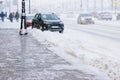 De-icing chemicals on winter road, Reagent - technical salt will make the road safe