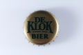 De Klok lid, beer caps, white background Royalty Free Stock Photo