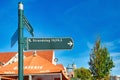 De Koog, Texel, Netherlands: Road sign leading to holiday park called `Strandslag` in front of blue sky