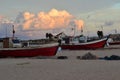 Sunset and boats in punta del diablo