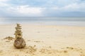 Dead coral reef on dry coconut fruit on the beach, monsoon season in south of Thailand Royalty Free Stock Photo