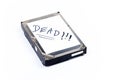 Dead defective silver metal 3.5 inch thick hard drive storage with a white text label isolated on white, object