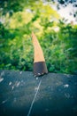 Discarded wasted ice cream cone on wall