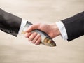 Dead Fish Handshake Royalty Free Stock Photo