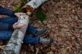 Dead man covered with a tree. the tree turned upside down and injured itself, falling while walking on a hiker, a forest worker. l Royalty Free Stock Photo