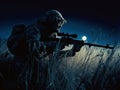 Silhouette of a Sniper on the Prowl Royalty Free Stock Photo