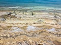 Dead sea beach - sand and salt layers Royalty Free Stock Photo