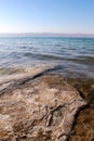 Dead Sea coastline, salt crystals in sand Royalty Free Stock Photo
