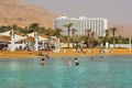 Vacationers and tourists bathe in the Dead Sea, Israel Royalty Free Stock Photo