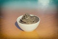 Dead Sea mud in a cup Royalty Free Stock Photo