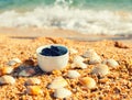 Dead sea mud in a cup Royalty Free Stock Photo