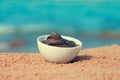 Dead Sea mud in a bowl Royalty Free Stock Photo