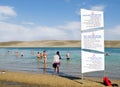 Dead Sea. People swim and sunbathe.