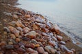 Dead Sea salty rocks stones in sunset light
