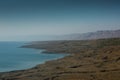 Dead sea in winter. Gloomy clouds over the dead sea Royalty Free Stock Photo