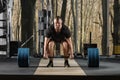 Deadlift attempt. Young man trying to lift heavy barbell Royalty Free Stock Photo