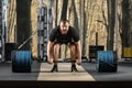 Deadlift attempt. Young man trying to lift heavy barbell Royalty Free Stock Photo